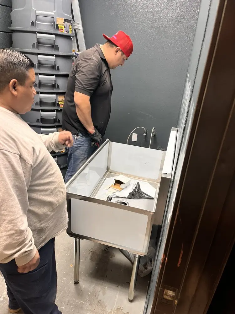 Commercial plumbing and sink installation in Exeter